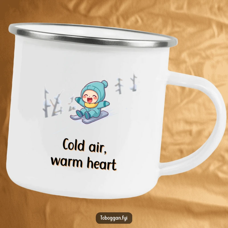 Funny character laughing while sledding down a snowy slope, featured on a sturdy camping mug for outdoor enjoyment.