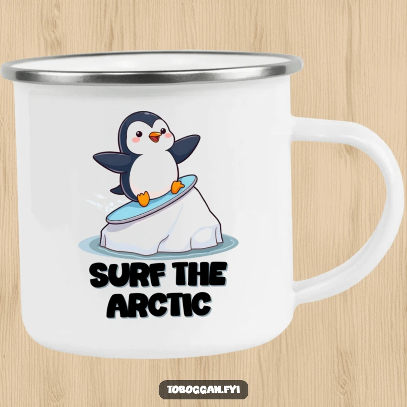 Funny playful penguin surfing on an iceberg on a sturdy camping mug, ideal for outdoor adventurers who love cute designs.