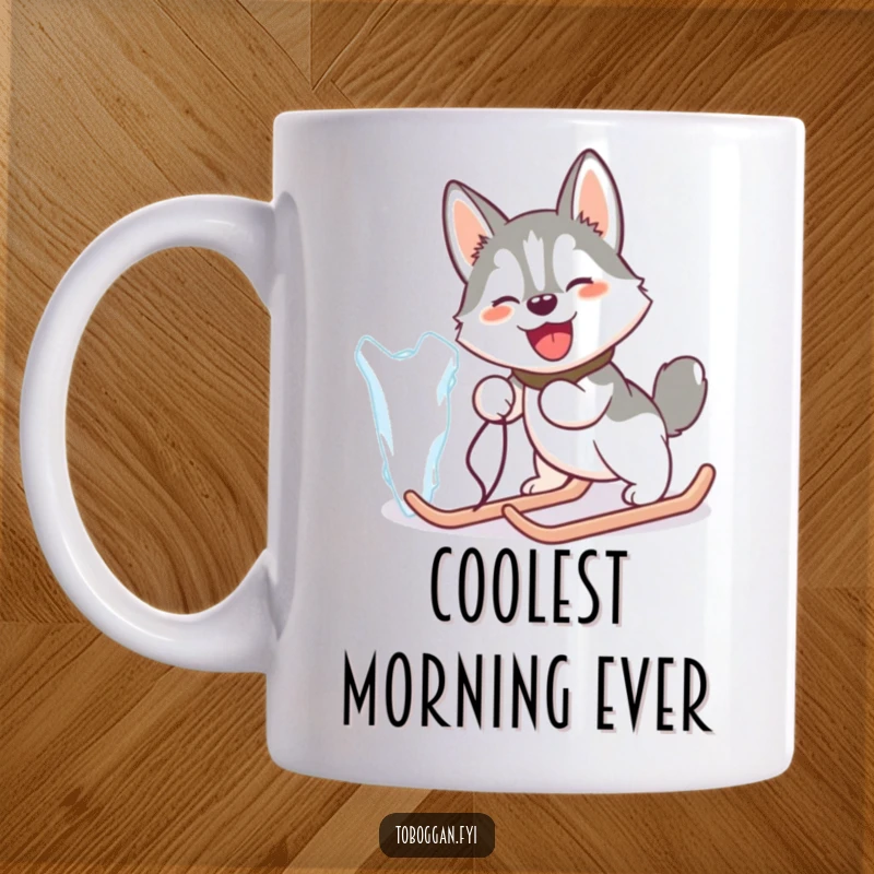 Funny mug featuring a happy husky comically attempting to pull a giant icicle like a sled in the snow.