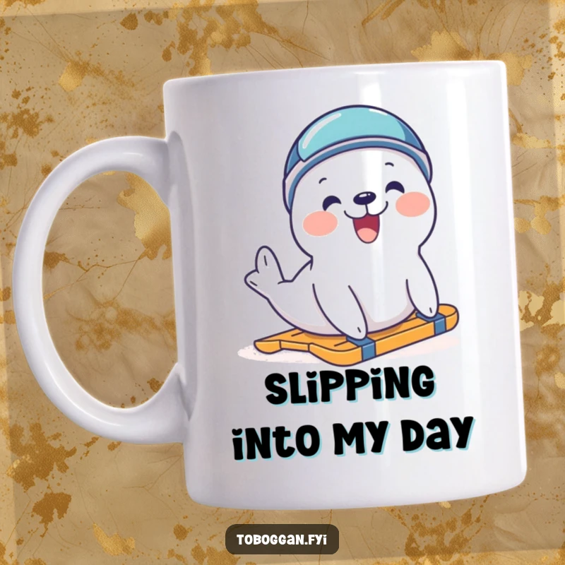 Funny delighted seal wearing a tiny helmet, joyfully trying to slide down a snowy hill on a mug, perfect for winter fun lovers.