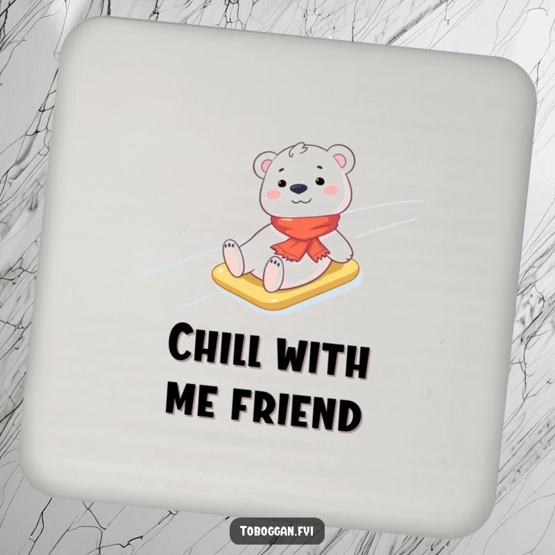 Funny Polar Bear Coaster: A cheerful polar bear cub wearing a tiny scarf is shown sliding down an icy slope, serving as a humorous table protector.
