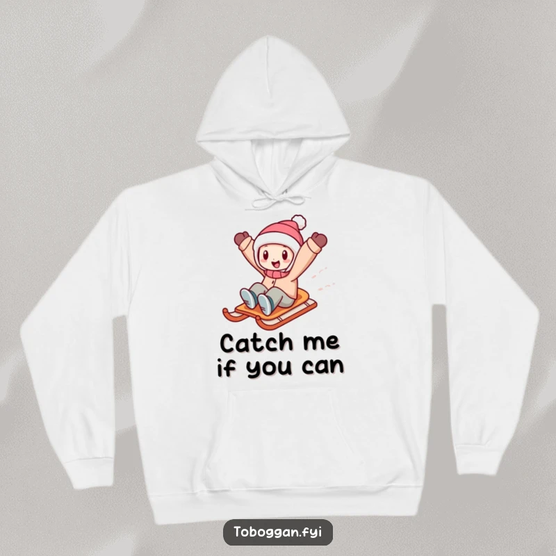 Funny character experiencing ultimate freedom while sledding downhill, arms spread wide, on a warm and humorous hoodie.