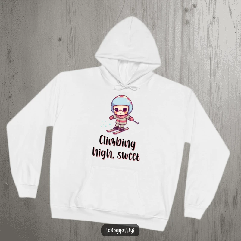 Funny candy cane hoodie featuring a determined character comically skiing uphill, offering warm and humorous winter wear.
