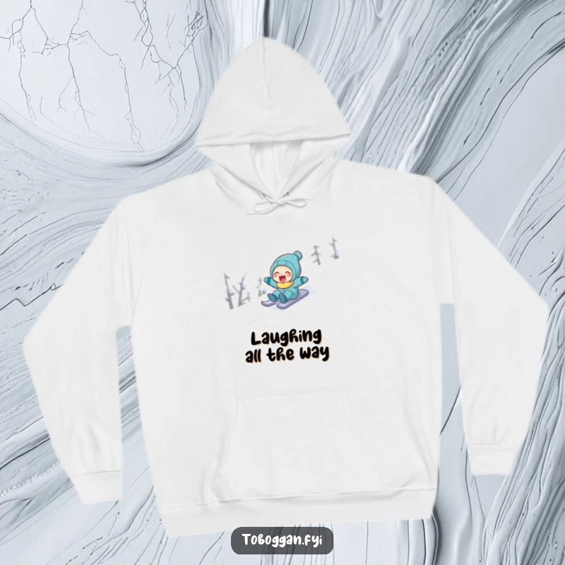 Funny character engrossed in laughter while sledding swiftly down a snowy mountain on a warm, humorous hoodie.