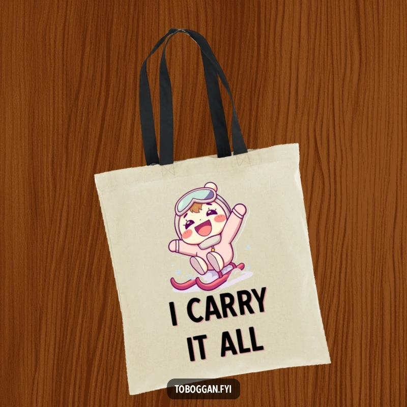 Funny tote bag with a character grinning widely while falling backward off a sled, illustrating a comical winter mishap and surprise element.